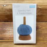 Rotating yarn holder