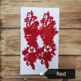 Pair of lace applique panels in red