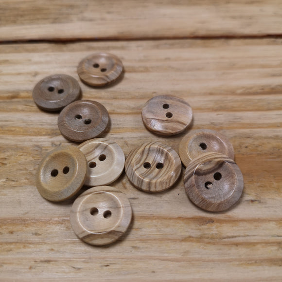 Wooden buttons with different natural grain patterns. Two-holes, suitable for knitwear, clothing and other craft projects.