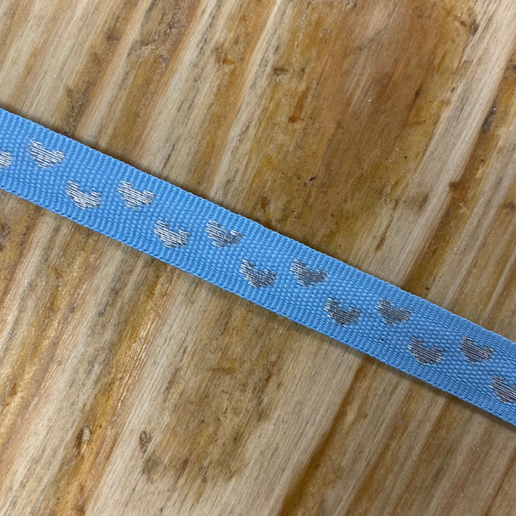 Blue ribbon with woven silver hearts