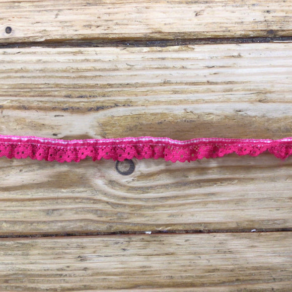 Ruffled lace trim on gingham ribbon