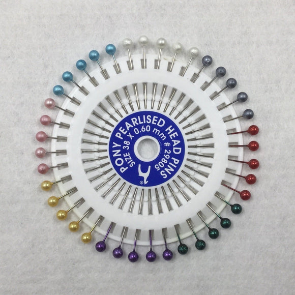 Pearl Head Pins Displayed On Disc