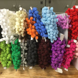 pom pom trim in a selection of colours