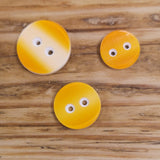 Two-tone button - semi-concave face